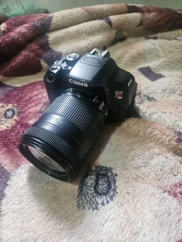 Canon EOS REBEL T4i + Lente Canon 18-135mm f4.5-5.6 IS