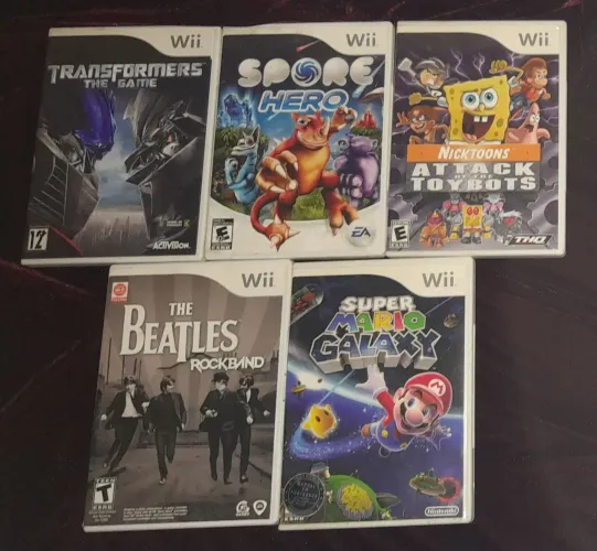 Kit/Lote 4 Jogos Wii - Super Mario Galaxy, Transformers, Spore Hero, Nicktoons e Beatles 