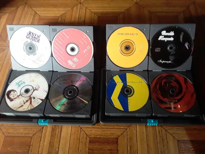 Portas cd's cheio com 24 cd's originais em cada um total 48 cd's