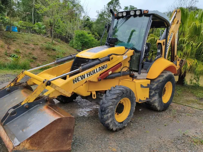 Retroescavadeira New Holland B95 B 4X4 cabine aberta