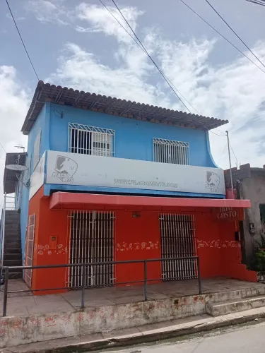 Vendo está casa grande com ponto comercial na vila São Luís anjo da guarda ZAP *38