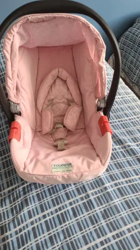 Vendo Bebê Conforto Burigotto Touring Evolution para crianças até 13kg, estado de novo