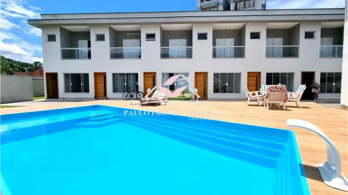 Casa de condomínio sobrado para venda tem 81 m² com 2 suítes - Praia do Massaguaçu- Caragu