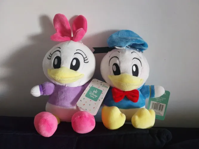 Pelúcias originais disney baby casal.