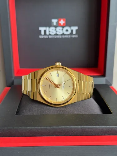 Relógio Tissot Prx 35mm Quartz dourado usado