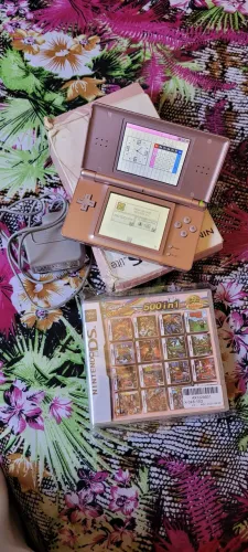 Nintendo ds lite rose com jogos leia anúncio