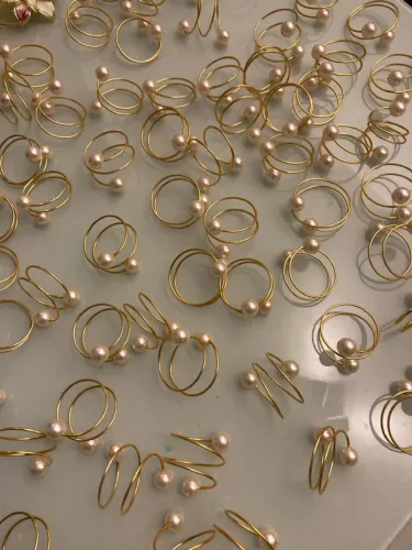 Anéis porta guardanapo Dourados com Pérolas