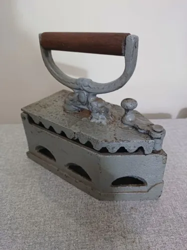 antigo ferro de brasa