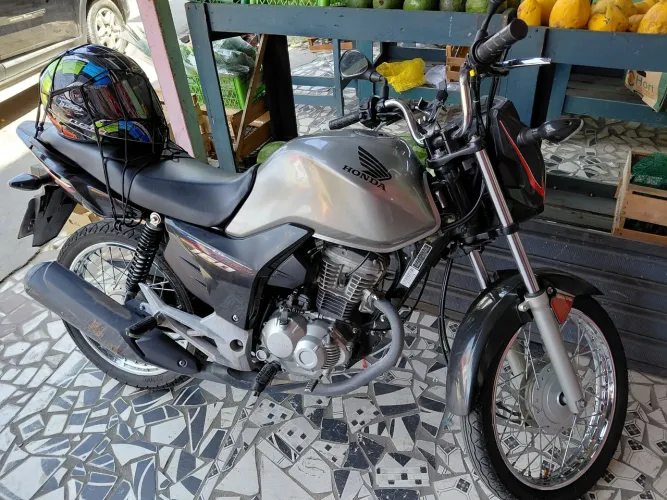 Troco por outra moto inferior, mais a volta em dinheiro documento do verde, tem que ir no