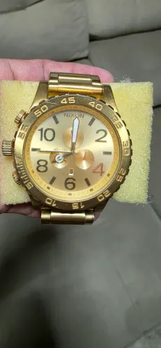 Relogio nixon dourado
