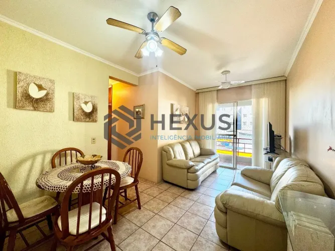 Apartamento com varanda e lazer na Praia da Enseada, Guarujá-SP.