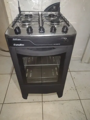 Fogão esmaltec 4 bocas tampo inox semi novo pra hj temos entrega não e elétrico