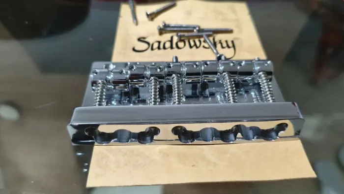 Ponte e tarraxa Sadowsky