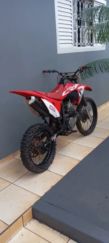 NX 350 pra trilha moto excelente