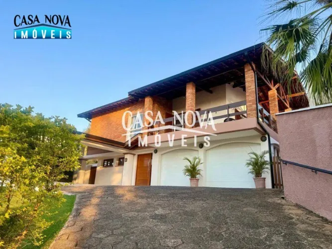 Casa com 3 dormitórios à venda, 252 m² por R$ 1.640.000,00 - Condomínio Marambaia - Vinhed