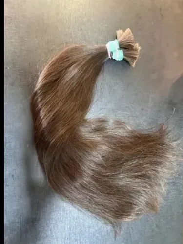 Cabelo humano brasileiro  de 65 cm virgem levemente ondulado