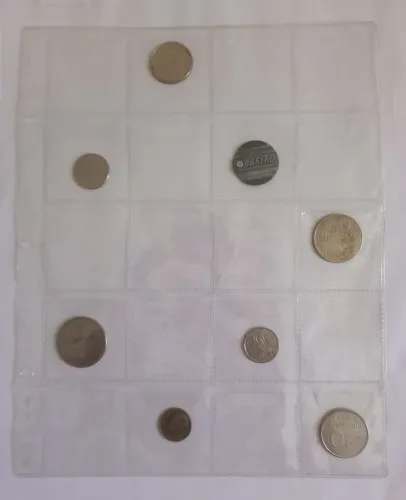 Folhas avulsas para guardar moedas de coleção