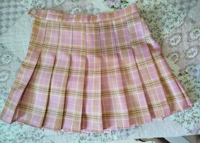 Saia plissada xadrez rosa
