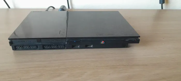Playstation 2 funcionando porém leitor está meio ruim