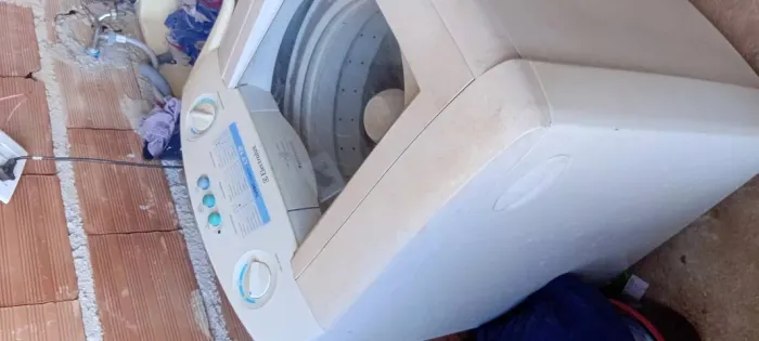 Máquina de lavar com defeito