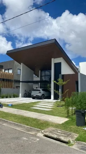 Casa de luxo no Alphaville Paraíba com 5 suítes, área gourmet integrada, escritório, jardi