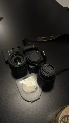 Nikon D3100 + 2 Lentes