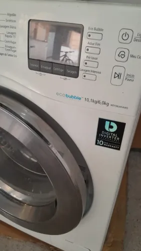 Máquina de lavar roupa usada