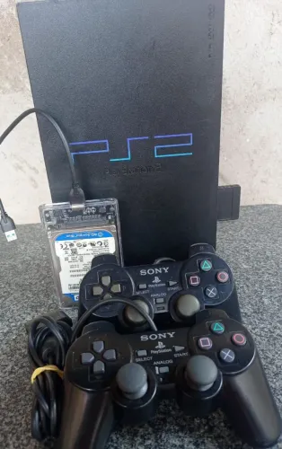 PS2 FAT 50001 110v Desbloqueado Matrix 1.99 leitor funcionando perfeitamente Envio Olx
