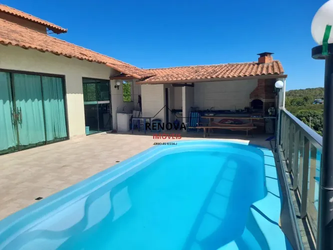 Casa mobiliada em um Cond. Fechado de 4 quartos/ 2 suítes perto V.V.-ES