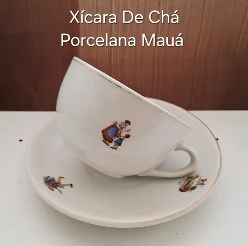 Xícara de chá vintage de porcelana Mauá com temas infantis para colecionadores