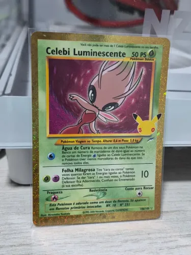 Carta pokemon tcg celebi luminescente 30 anos