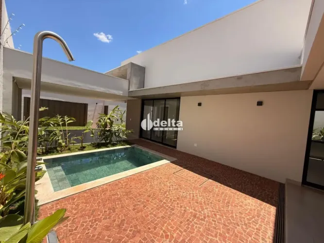 Casa com 3 suítes disponível para venda no bairro Jardim Karaíba em Uberlândia?MG