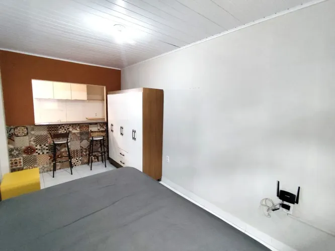 Kitnet com 1 dormitório para alugar, 30 m² por R$ 1.502,48/mês - Barreiros - São José/SC