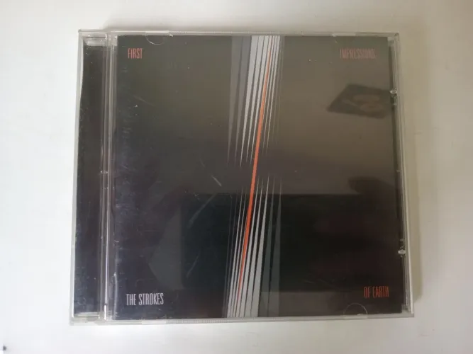CD STROKES FIRST IMPRESSIONS OF EARTH
