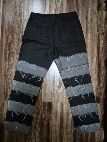 calça jeans preta retalhada 38/40 unissex