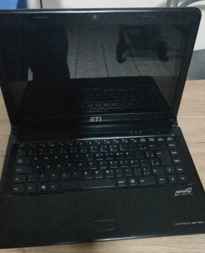Notebook Semp Toshiba NA 1401 com processador AMD -70@1.00ghz, HD320GB, 4GB de memória