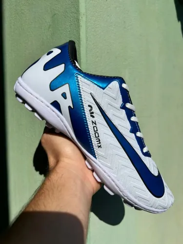 Chuteira Nike azul com branco 34 ao 39 society mas informações ZAP *40