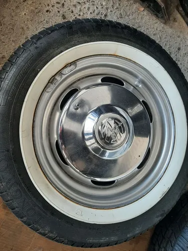 Roda de ferro aro 14 com calota cromada Vw pneu 175 65 14 usado com faixa branca jogo
