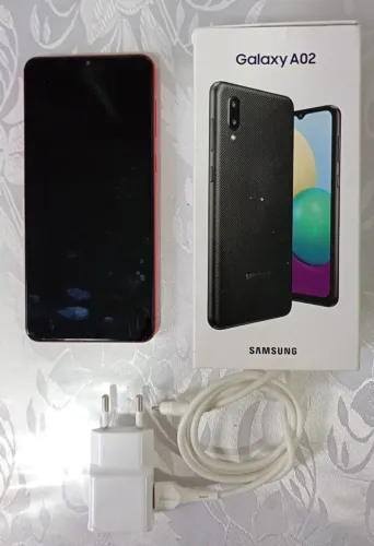 Samsung A02 + carregador original Samsung + cabo USB + película + capa