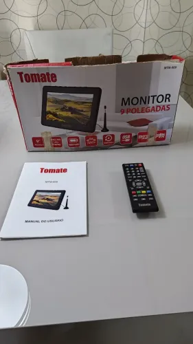 TV Portátil 9 pol, Marca TOMATE modelo MTM-909, em perfeito estado.