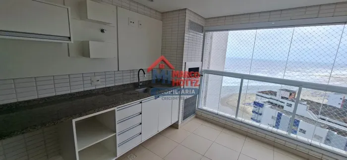 Locação de excelente apartamento com 2 dormitórios sendo 1 suíte frente mar.