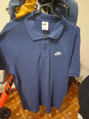 Polo nike original azul marinho avaliada em 350
