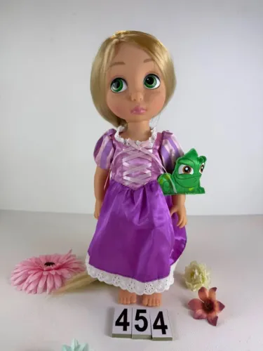 RAPUNZEL DISNEY ANIMATORS TEM UMAS MANCHINHAS LEVES NO ROSTO