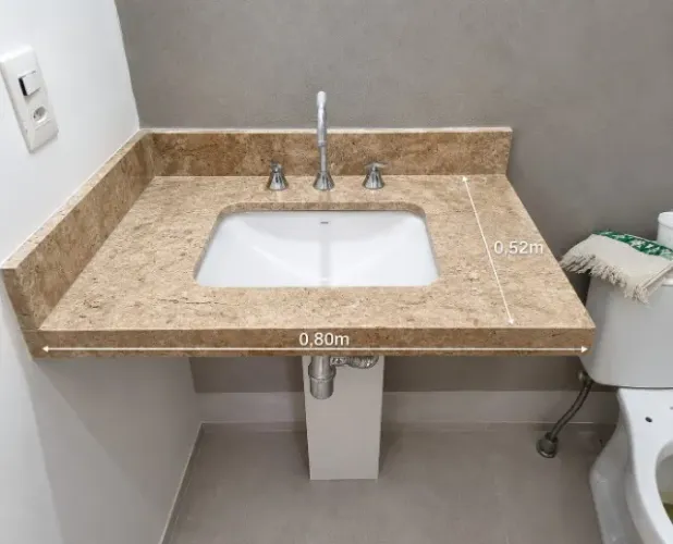 Lavatório travertino com cuba e torneira