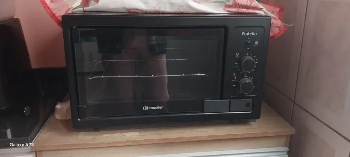 Vende se um forno elétrico Mueller de 44 litros usado menos d um mês,valor 300,00