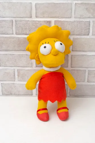 Boneca de pelúcia Lisa Simpson<br>Mede aproximadamente 35cm de altura<br>peça seminova