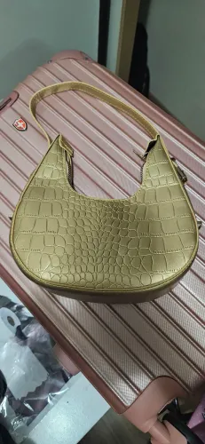 Bolsa de festas dourada