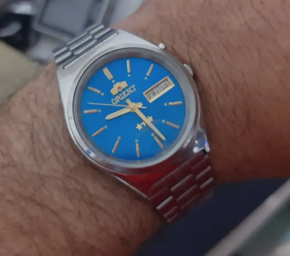 Relógio ORIENT antigo automático olho azul RELIQUIA lindo