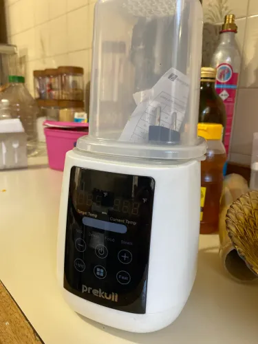 Aquecedor de leite e esterilizador de mamadeiras