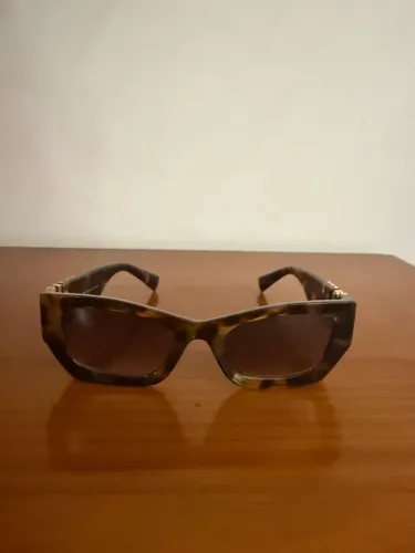 Óculos tartaruga Miu Miu